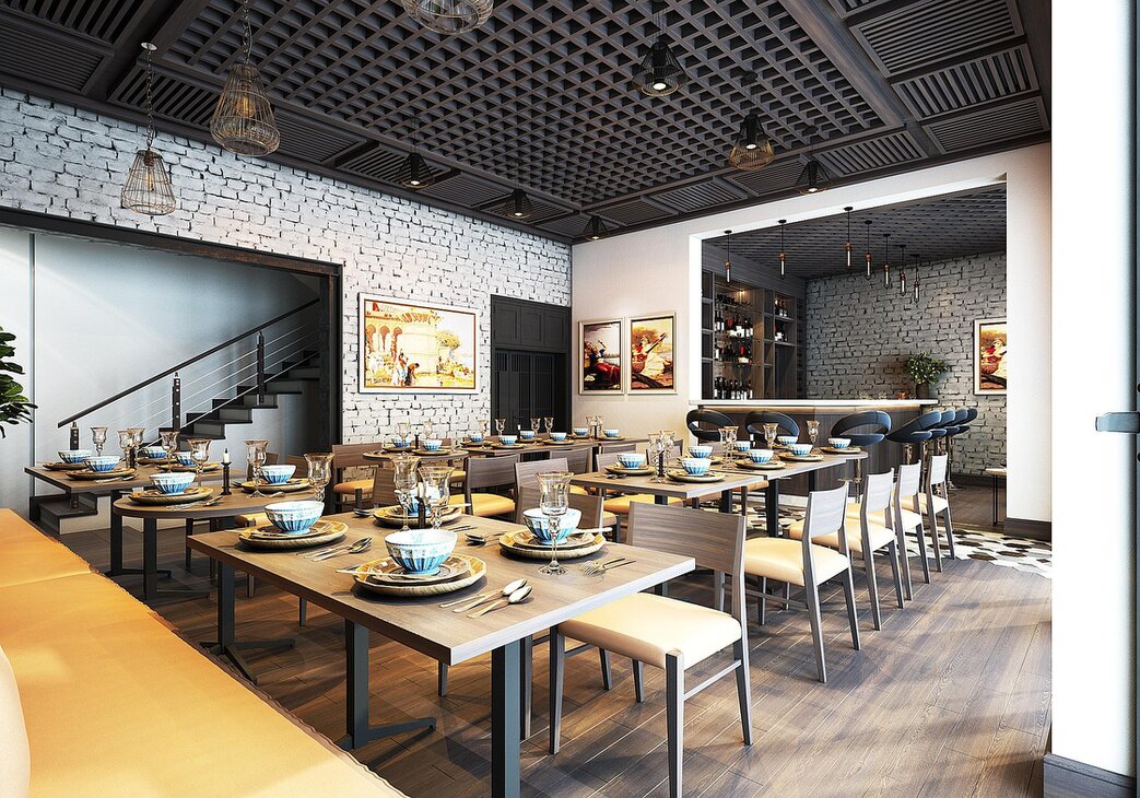 Tavolo apparecchiato in ristorante con servizio professionale